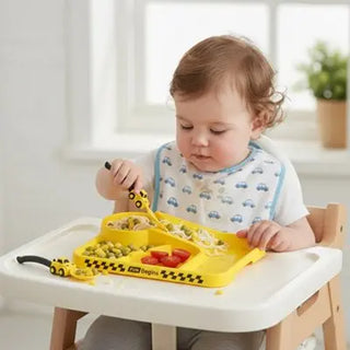 Universal Nest baby feeding plate with non-slip bottom, unbreakable plastic, designed for toddler meal times, in vibrant colors.