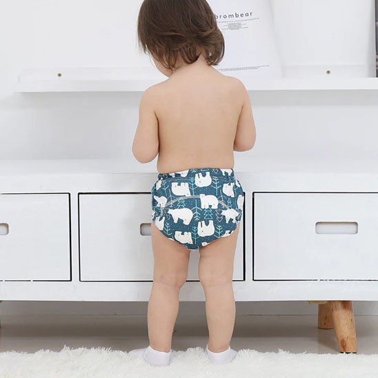 Reusable eco-friendly cloth diaper by Univers Nest, showing soft fabric and adjustable fasteners.