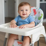 Comfortable washable high chair cushion by Univers Nest, featuring soft fabric and secure straps for baby seating comfort.