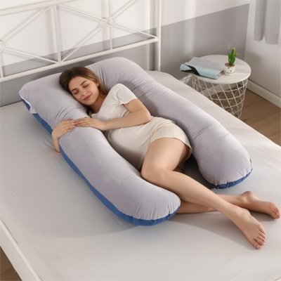Pregnancy pillow from Univers Nest offering optimal comfort, shown in a cozy, supportive position for expecting mothers.