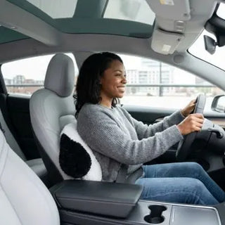 Ergonomic lumbar support cushion for moms by Univers Nest, designed for car back support and comfort during drives.