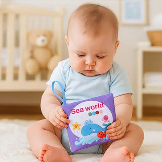 Soft baby cloth book by Univers Nest featuring colorful fabric pages for sensory development and early learning.