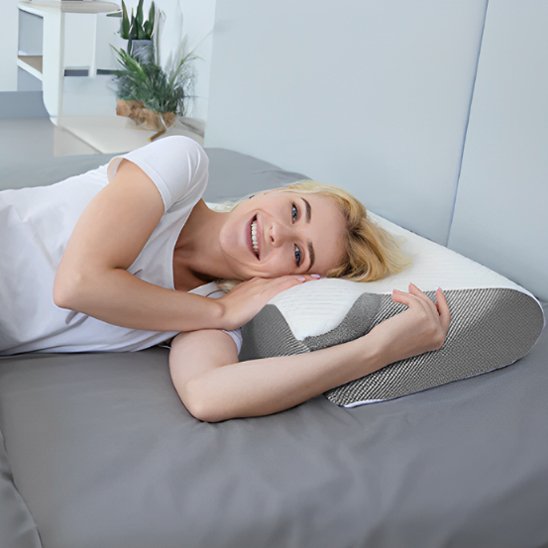 Ergonomic pillow by Univers Nest providing comfortable support, designed for optimal neck and head alignment.