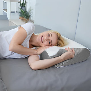 Ergonomic pillow by Univers Nest providing comfortable support, designed for optimal neck and head alignment.