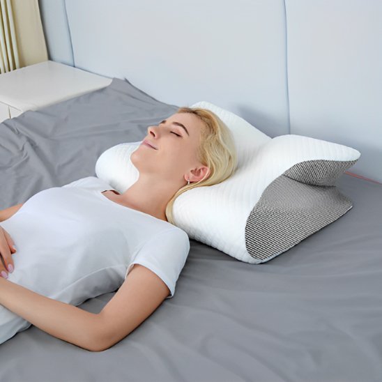 Univers Nest ergonomic pillow provides comfort and support, featuring a contoured design for optimal head and neck alignment.