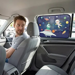 Universal Nest baby car sunshade providing UV protection, visible with a lightweight, foldable design blocking sunlight from a vehicle window.