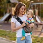 Ergonomic baby carrier by Univers Nest showing adjustable straps and padded design for comfortable infant carrying.