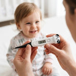 Digital thermometer from Univers Nest showing a precise and quick temperature reading with a sleek design.