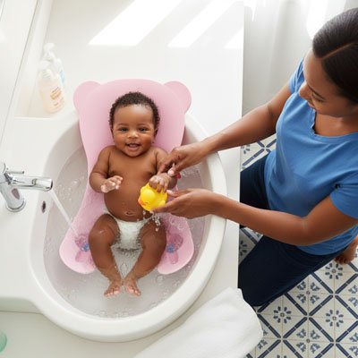 Ergonomic baby bath seat from Univers Nest with soft padding and supportive design for comfortable bathing.